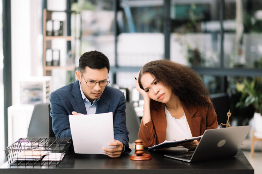 Business team and lawyers discussing contract pape 2023 11 27 05 03 22 utc 1 1.jpg